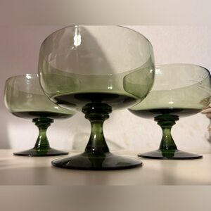 3 green, glass champagne glasses. 3.5”